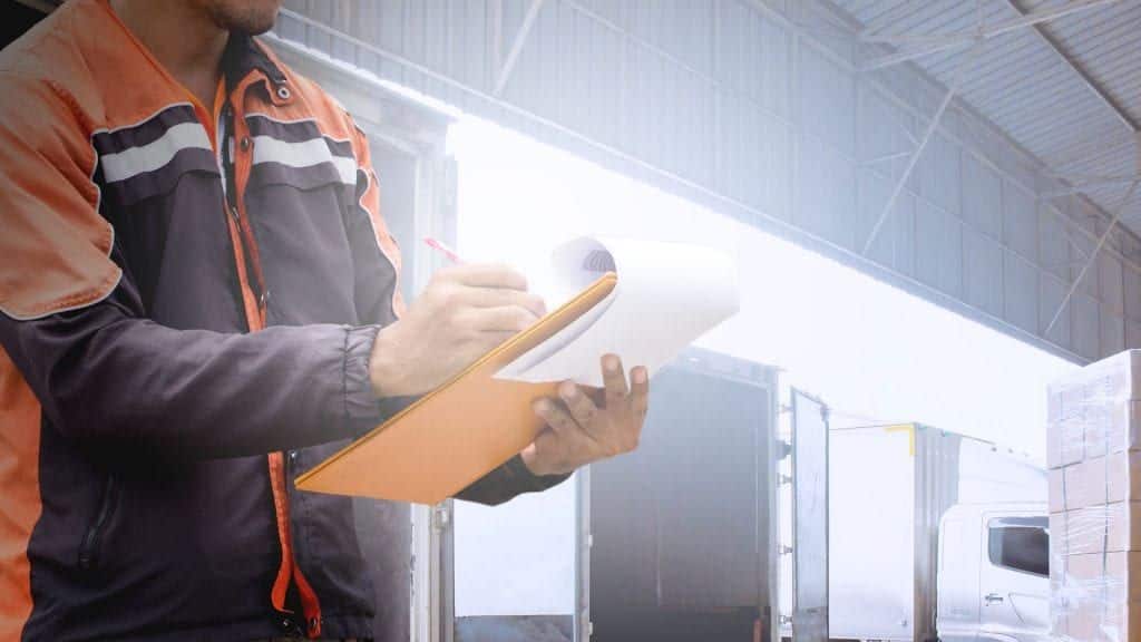 Man holding clipboard