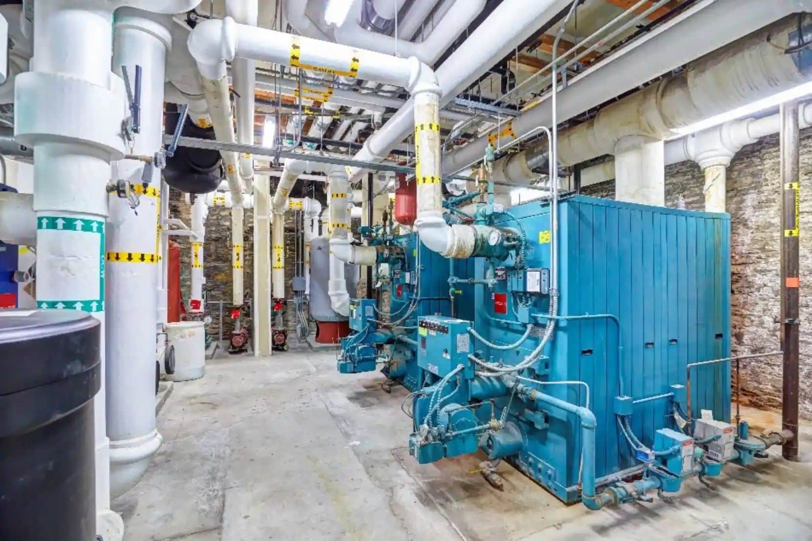 Two redundant atmospheric-boilers provide supplementary heat for the buildings IPS